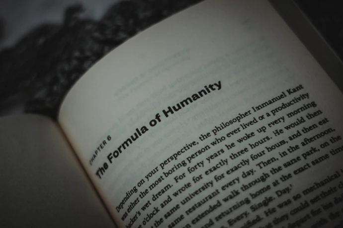 a close up of an open book with text